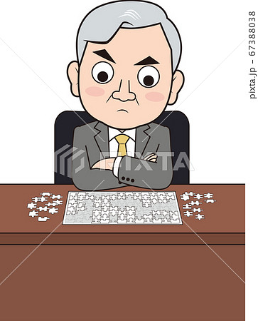 パズルで悩む男性社長 67388038