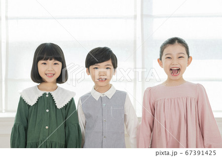 Happy children concept, a portrait of asian children smiling 153 67391425