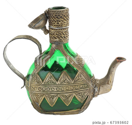 Antique decorated tea bottle over white background 67393602