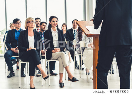 Group of business people meeting in a seminar conference 67397306