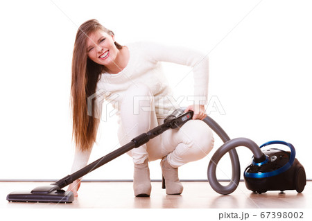 Funny girl with vacuum cleaner. Housework Funny girl with vacuum cleaner. Housework 67398002