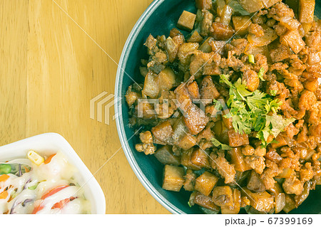 Stir Fried Pork with Onion and Black Soy Sauce and Vegan Salad on Flaylay View in Vintage Tone Stir Fried Pork with Onion and Black Soy Sauce and Vegan Salad on Flaylay View in Vintage Tone 67399169