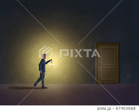 Man in the dark with a lantern 67403688