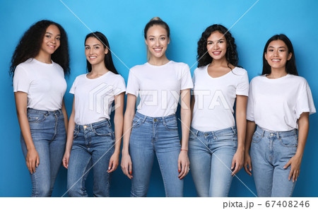 Five Model Girls Smiling To Camera Posing Over Blue Background Five Model Girls Smiling To Camera Posing Over Blue Background 67408246