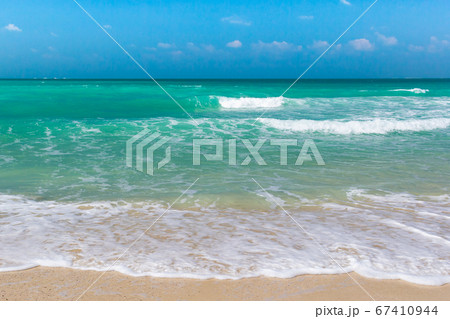 Soft Blue Ocean Wave On Sandy Beach. Background. 67410944