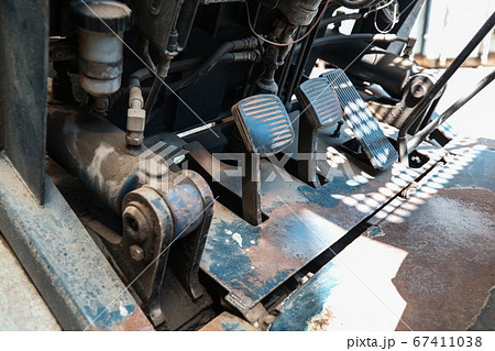 Electric forklift in warehouse from the inside, pedals 67411038