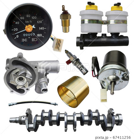 A lot of new auto parts isolated on a white background. Autoshop. A lot of new auto parts isolated on a white background. Autoshop. 67411256