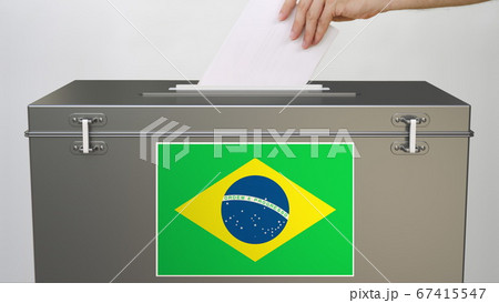 Putting paper ballot into ballot box with flag of Brazil. Voting related 3d rendering 67415547