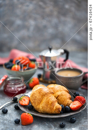 Continental breakfast with croissants Continental breakfast with croissants 67416434