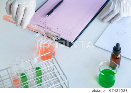 Scientist wear lab coat and protective wear are Scientist wear lab coat and protective wear are 67422523