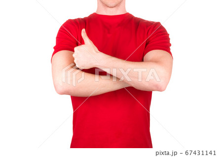 Front view of confident male in red t-shirt showing thumbs up gesture isolated Front view of confident male in red t-shirt showing thumbs up gesture isolated 67431141