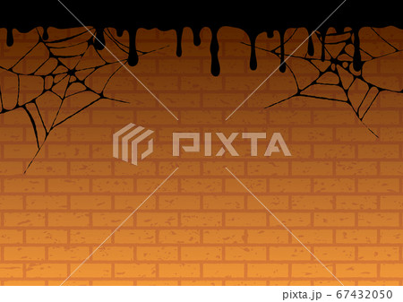 蜘蛛の巣がかかった不気味な煉瓦の壁 67432050