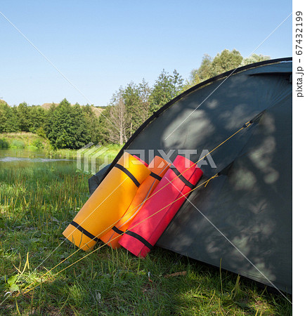 Campsite near the river Campsite near the river 67432199