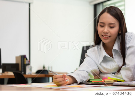 Asian business man and women meeting and talk about job in office. Asian business man and women meeting and talk about job in office. 67434436