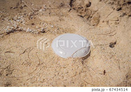 Garbage on a beach, environmental pollution concept Garbage on a beach, environmental pollution concept 67434514