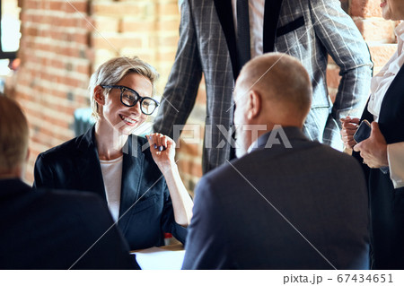 Business people at the negotiating table in the office 67434651