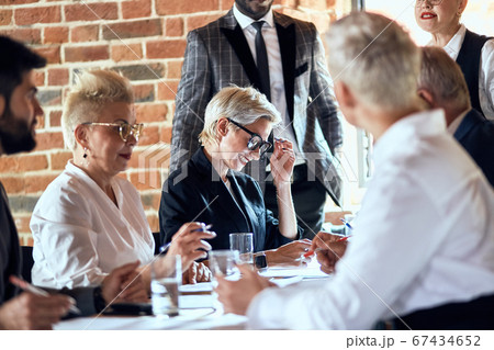 Business people at the negotiating table in the office 67434652