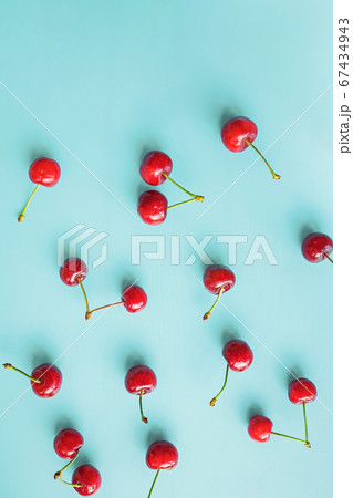 Flat lay with fresh red cherries 67434943
