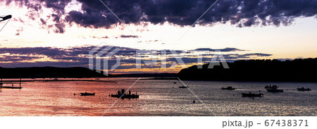 Sunset over the waters of Bar Harbor Maine Sunset over the waters of Bar Harbor Maine 67438371