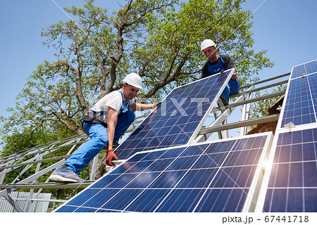 Stand-alone exterior solar panel system installation, renewable green energy generation concept. 67441718
