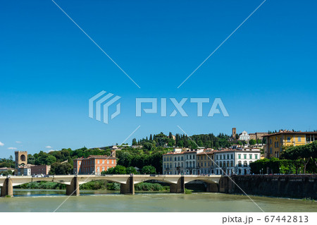 Florence, the Arno river and a bridge 67442813