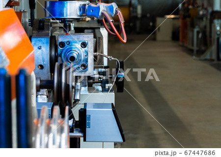 Cable production. Close up of a cable reel Cable production. Close up of a cable reel 67447686