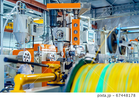 Cable production in process. Cable factory close up 67448178