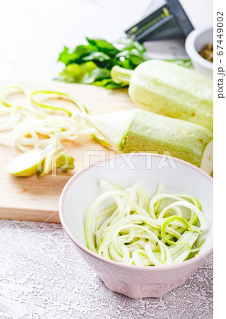 Zucchini Spaghetti on light background 67449002