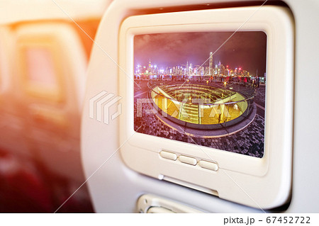Aircraft monitor in front of passenger seat Aircraft monitor in front of passenger seat 67452722
