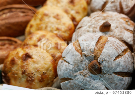 different types of bread on the bakery shelf 67453880