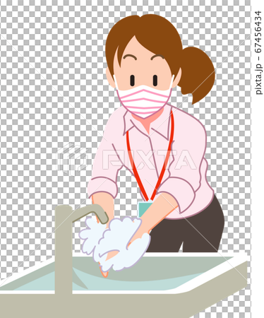 Female employee wearing a mask and washing hands 67456434