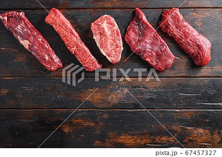 A set of different types of raw beef steaks A set of different types of raw beef steaks 67457327