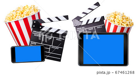 Flying popcorn, film clapper board and phone isolated on white background 67461268