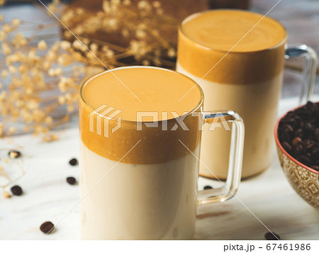 Whipped dalgona coffee drink in mug 67461986