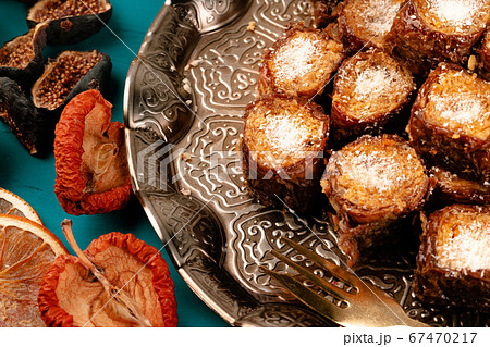 Turkish delight dessert on traditional tableware on dark blue table 67470217