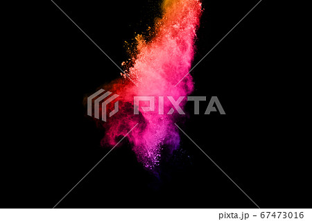 abstract colored dust explosion on a black background.abstract powder splatted background,Freeze motion of color powder exploding/throwing color powder, multicolored glitter texture. 67473016