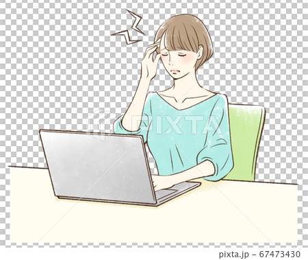 Woman suffering from headache in front of personal computer 67473430