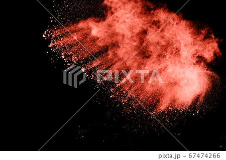 Living Coral  color powder explosion on white background. Colored cloud. Colorful dust explode. Paint Holi. 67474266