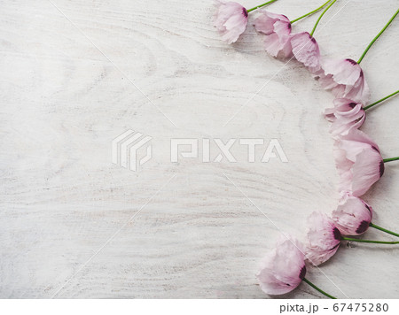 Beautiful wildflowers lying on a wooden table 67475280