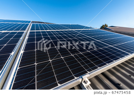 New solar panels on house roof 67475458