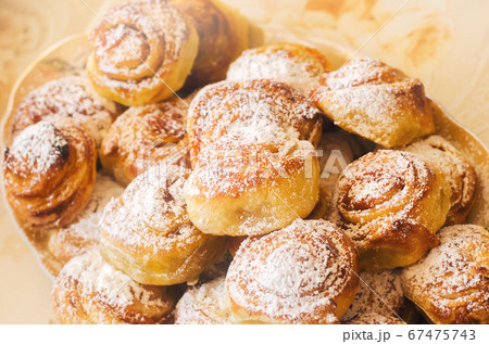Sweet fragrant buns with jam. Puff pastry rolls. Close-up. Soft selective focus Sweet fragrant buns with jam. Puff pastry rolls. Close-up. Soft selective focus 67475743