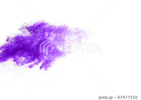 Powder explosion. Closeup of a purple dust particle explosion isolated on white. Abstract background. 67477550