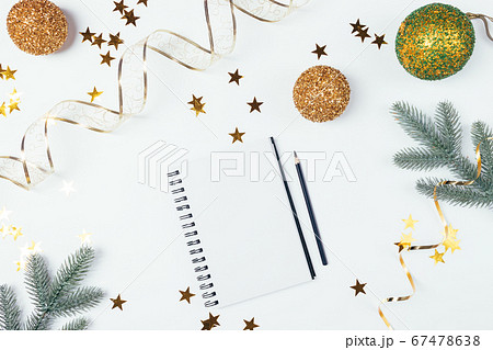 Top view blank notebook among golden Christmas Top view blank notebook among golden Christmas 67478638