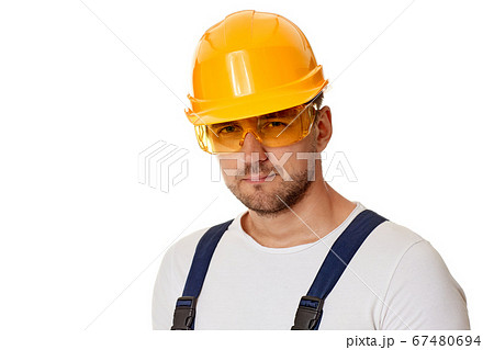portrait of caucasian man construction worker in yellow hard hat 67480694