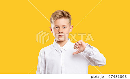 dislike gesture shame dissatisfied boy thumb down dislike gesture shame dissatisfied boy thumb down 67481068