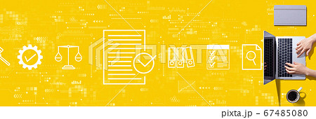 Compliance concept with person using a laptop Compliance concept with person using a laptop 67485080