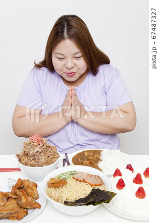 大食いのメタボ女性の写真素材
