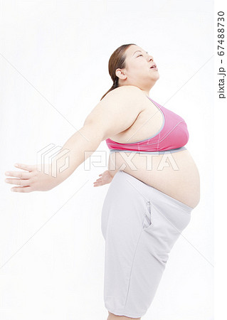 メタボ女性のお腹の写真素材