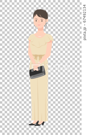 A cute woman in a pants dress for attending a wedding. 67492134
