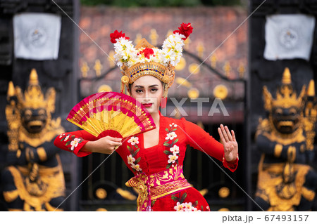 Balinese girl performing traditional dress Balinese girl performing traditional dress 67493157